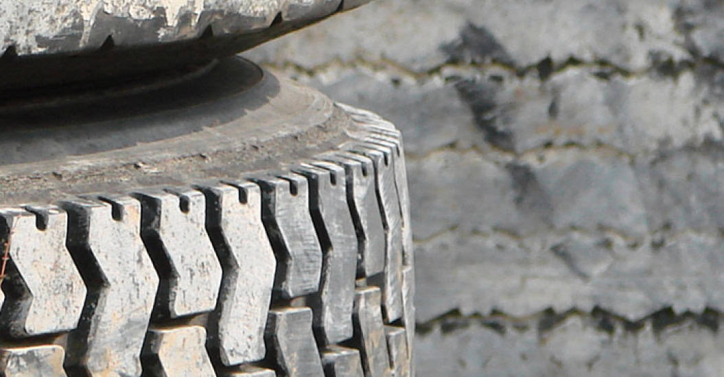 stack of car tyres