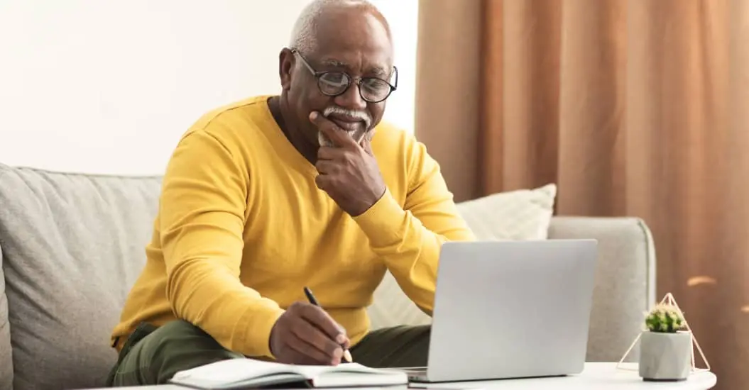 Old man calculating his contents value